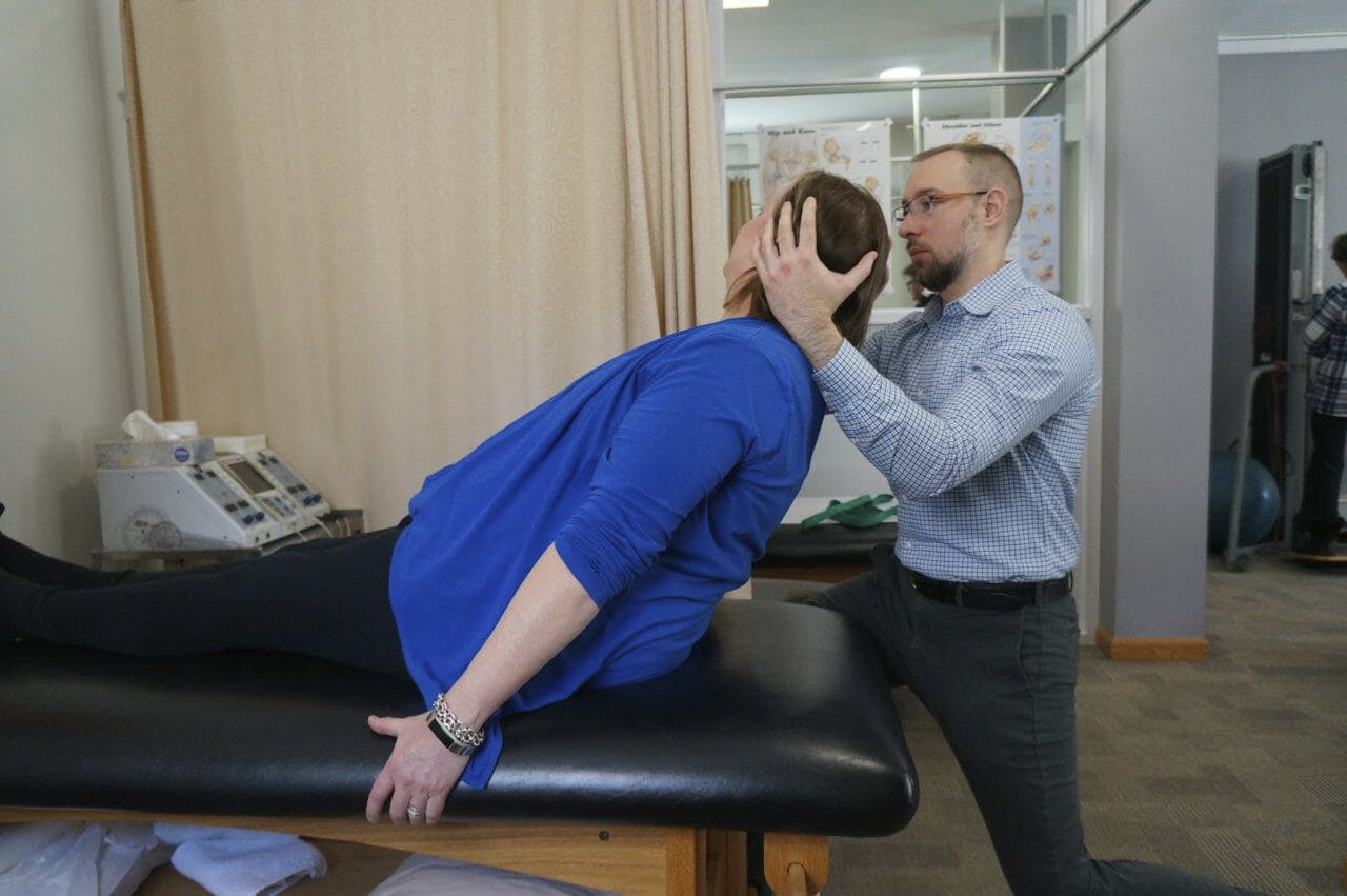 Edward Umheiser, DPT treating patient with Vestibular Rehabilitation Therapy