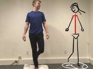 man standing on one leg