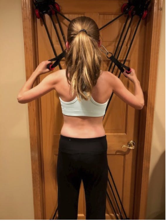 Caroline doing back strengthening exercises