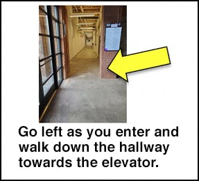 Go left as you enter and walk down the hallway towards the elevator.