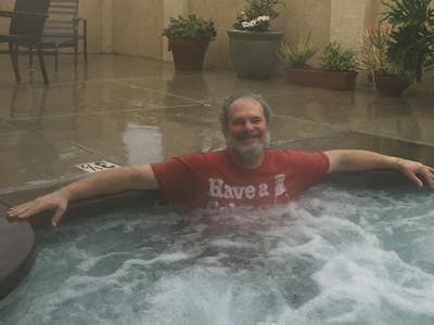 Johnny Ace Palmer enjoying the jacuzzi in the rain after his PT session.